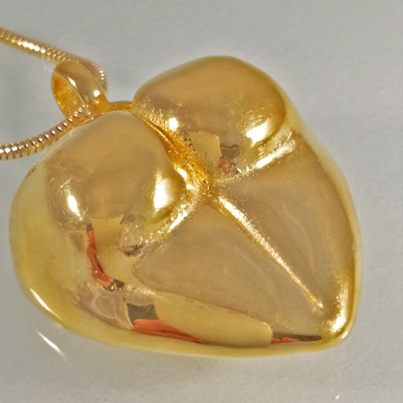 Erotikschmuck, Herzanhänger Yoni-heart, vergoldet, Rückseite